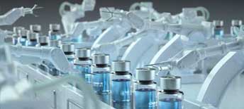 vaccine vials on manufacturing line